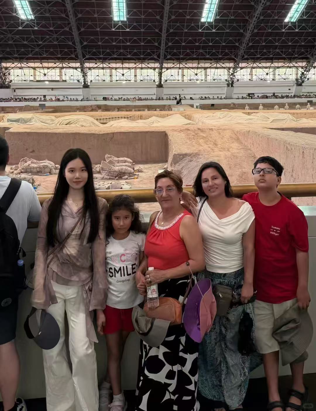 Family with guide at the Terracotta Warriors Museum in Xi'an